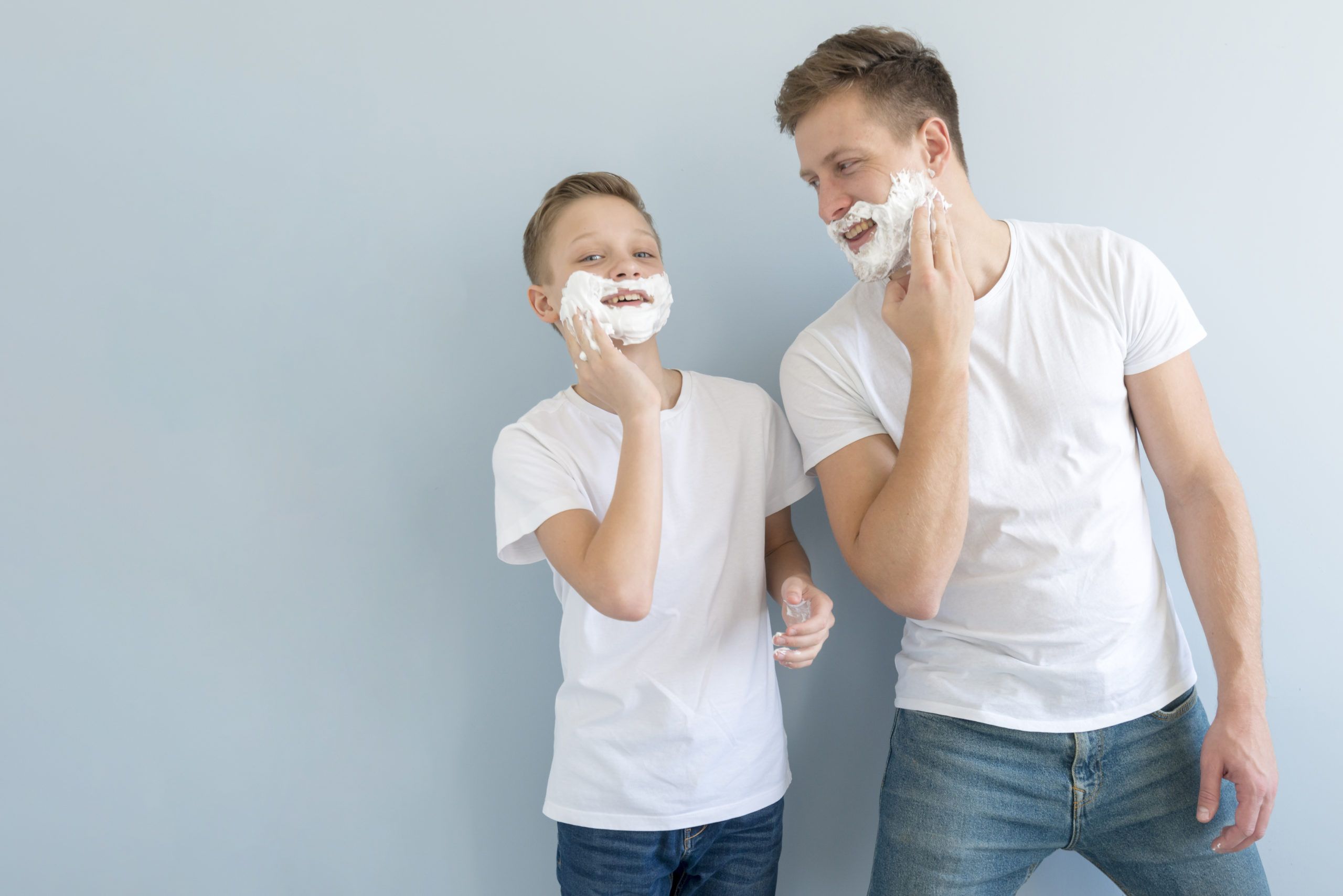 front-view-boys-using-shaving-foam
